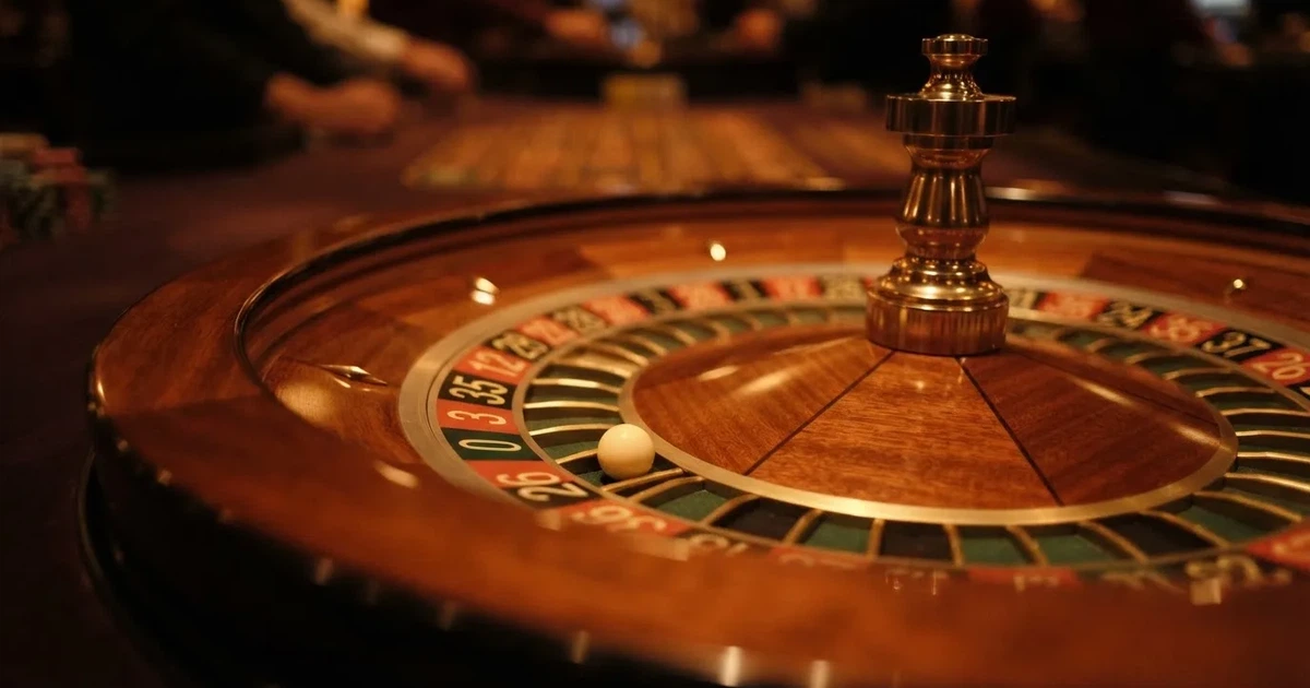 A close-up of a roulette wheel with the ball settling into a numbered pocket.